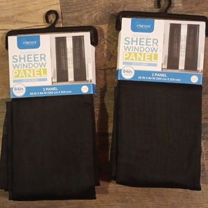 Two light filtering sheer window panels